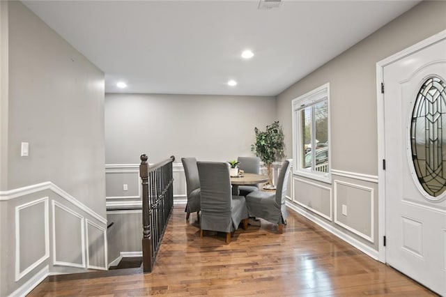 1684 Braeburn Dr SE, Atlanta, GA 30316 - dining area with wood finished floors, a decorative wall, recessed lighting, and wainscoting