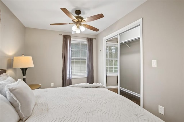 1684 Braeburn Dr SE, Atlanta, GA 30316 - bedroom featuring dark wood finished floors, baseboards, ceiling fan, and a closet