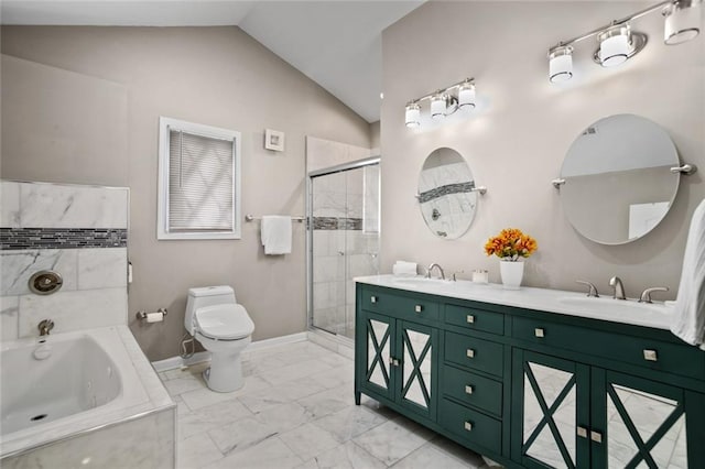 1684 Braeburn Dr SE, Atlanta, GA 30316 - full bath with toilet, a bath, double vanity, vaulted ceiling, and a stall shower