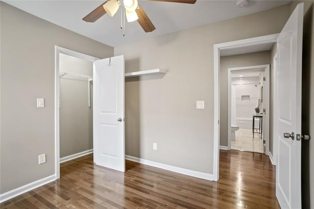 1684 Braeburn Dr SE, Atlanta, GA 30316 - unfurnished bedroom featuring wood finished floors, baseboards, a closet, and ceiling fan