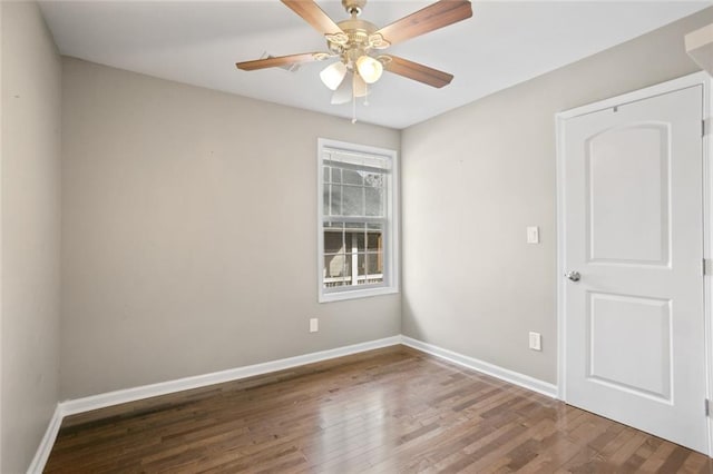 1684 Braeburn Dr SE, Atlanta, GA 30316 - unfurnished room featuring wood finished floors, baseboards, and a ceiling fan