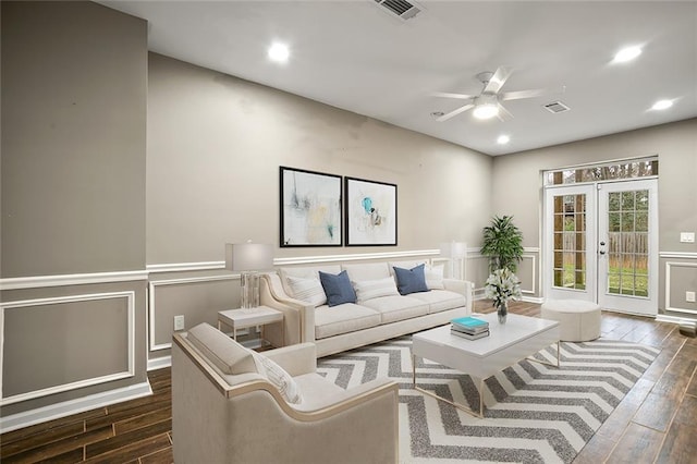 1684 Braeburn Dr SE, Atlanta, GA 30316 - living area with wood finished floors, a ceiling fan, recessed lighting, wainscoting, and a decorative wall