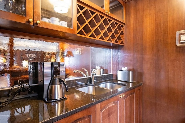 bar featuring wet bar and a sink