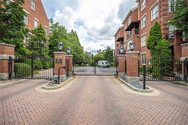 view of gate featuring fence