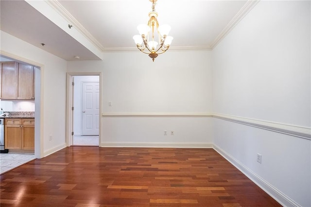 unfurnished dining area with a chandelier, dark wood-type flooring, baseboards, and crown molding