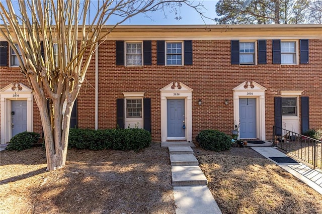 multi unit property with brick siding