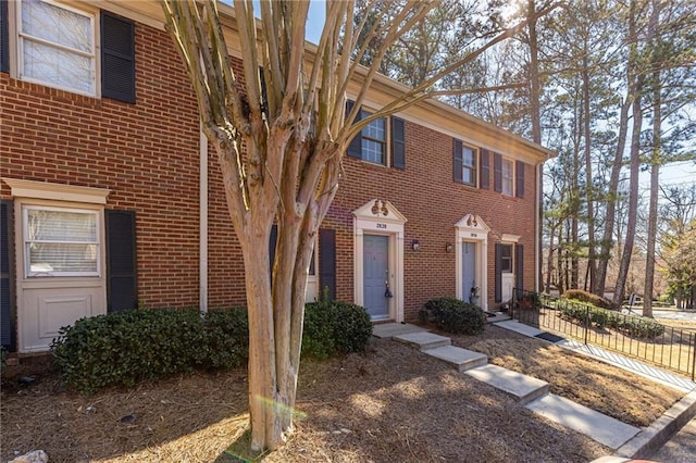 view of front of home with brick siding