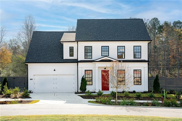 view of front of property featuring a garage