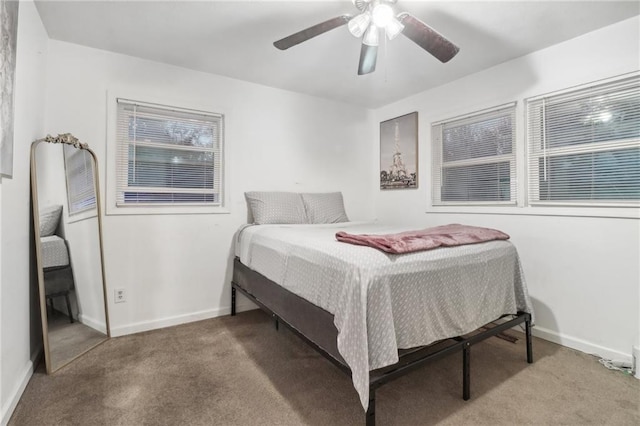 bedroom with ceiling fan and carpet floors