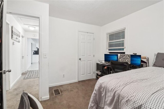 bedroom featuring carpet floors