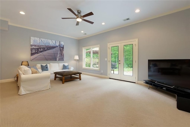carpeted living room featuring visible vents, recessed lighting, baseboards, and a ceiling fan