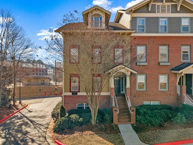 view of front of home with brick siding