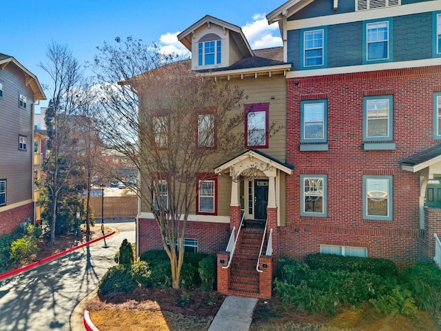 view of front of property with brick siding