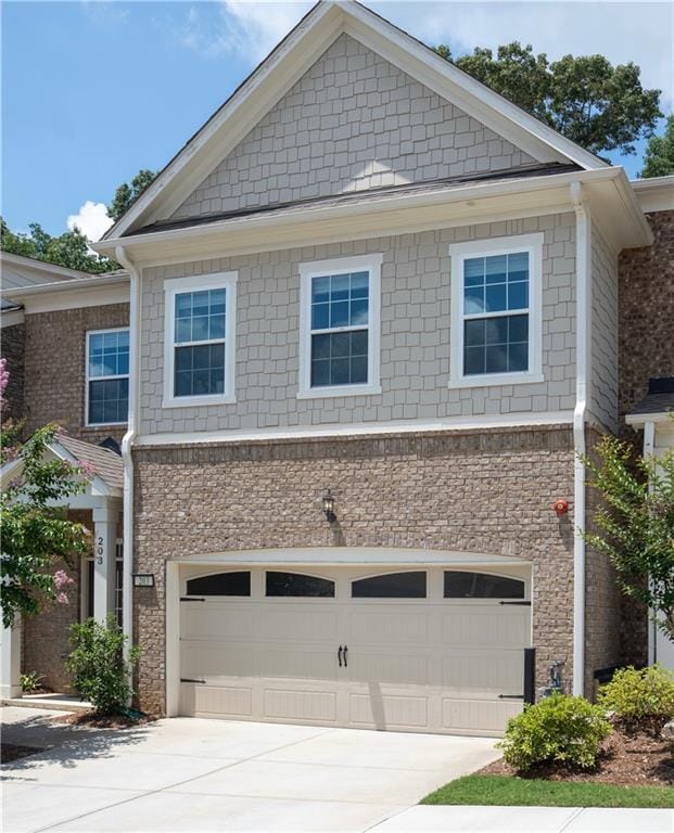 203 Holden Way, Woodstock, GA 30189 - view of front of house featuring an attached garage and concrete driveway