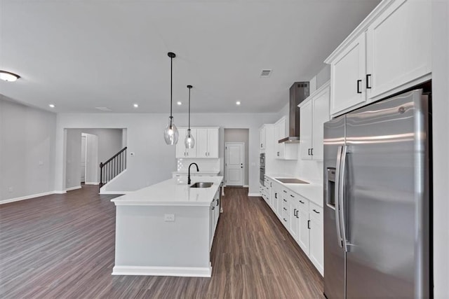 212 Birchwood Row, Canton, GA 30115 - kitchen featuring stainless steel refrigerator with ice dispenser, wall chimney range hood, a sink, black electric cooktop, and dark wood finished floors