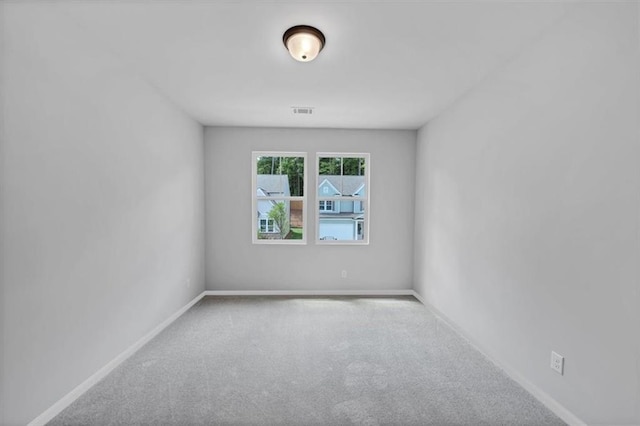 212 Birchwood Row, Canton, GA 30115 - carpeted spare room featuring baseboards