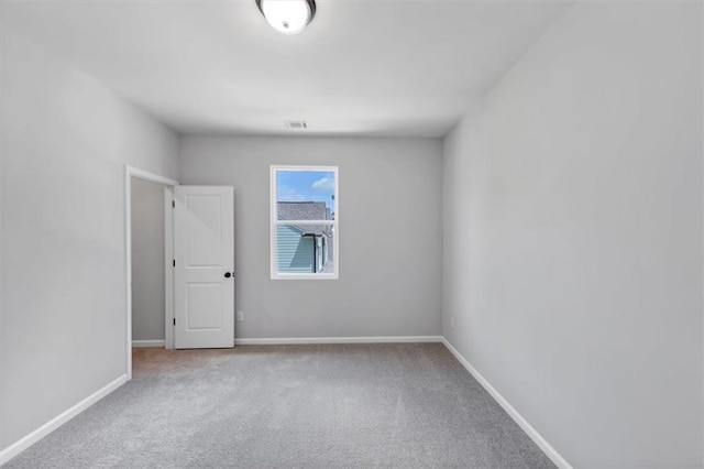212 Birchwood Row, Canton, GA 30115 - spare room featuring carpet flooring and baseboards