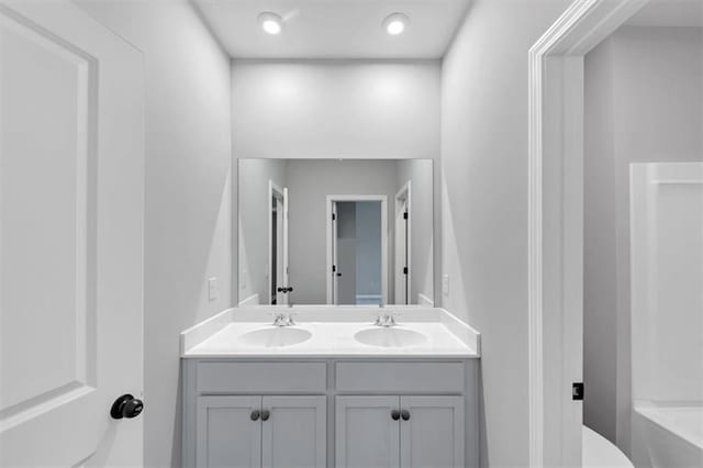 212 Birchwood Row, Canton, GA 30115 - bathroom featuring double vanity and toilet