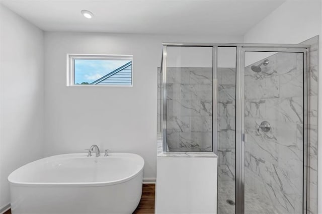 212 Birchwood Row, Canton, GA 30115 - full bath with a marble finish shower, a soaking tub, wood finished floors, and baseboards