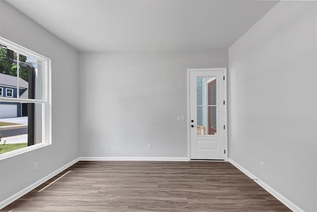 212 Birchwood Row, Canton, GA 30115 - unfurnished room featuring wood finished floors and baseboards