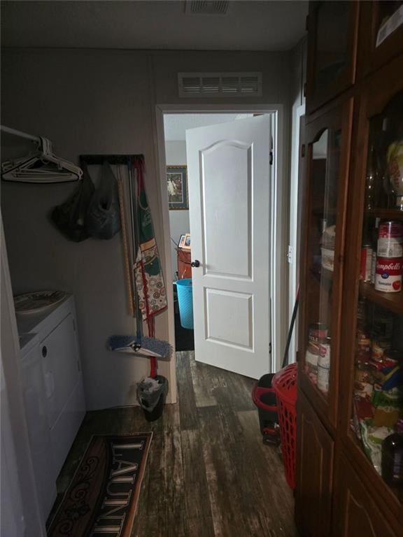 interior space featuring visible vents and wood finished floors