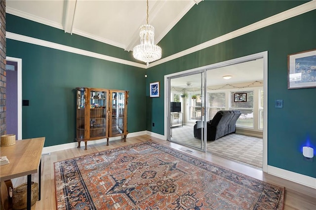 191 Durham St, Dallas, GA 30132 - interior space with wood finished floors, a chandelier, baseboards, crown molding, and french doors