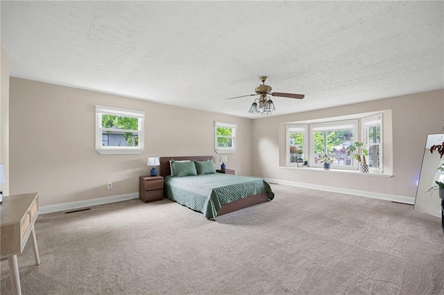 191 Durham St, Dallas, GA 30132 - bedroom featuring a textured ceiling, baseboards, carpet floors, and ceiling fan