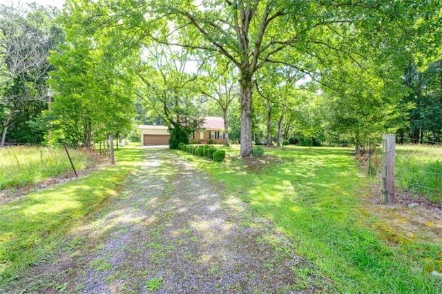 1434 Culpepper Rd, Calhoun, GA 30701 - view of yard with driveway and a garage