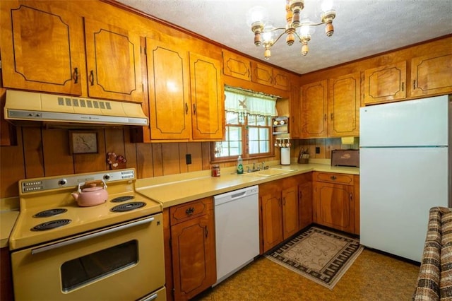 1434 Culpepper Rd, Calhoun, GA 30701 - kitchen featuring white appliances, under cabinet range hood, a chandelier, brown cabinetry, and a textured ceiling