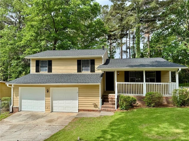 tri-level home with driveway, roof with shingles, covered porch, a front yard, and an attached garage