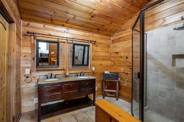 bathroom with a sink, lofted ceiling, wooden ceiling, and a shower stall