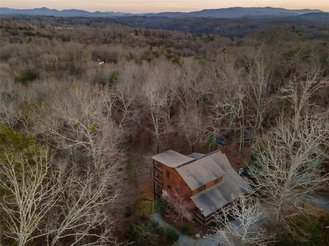 aerial view with a forest view and a mountain view