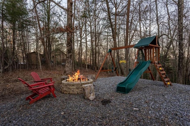 view of play area with a fire pit