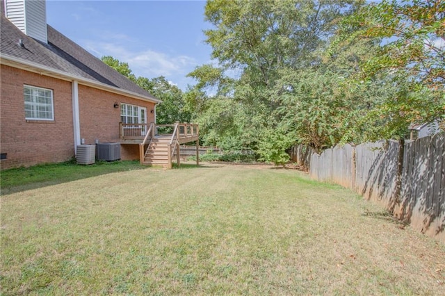 view of yard with stairway, cooling unit, a fenced backyard, and a wooden deck