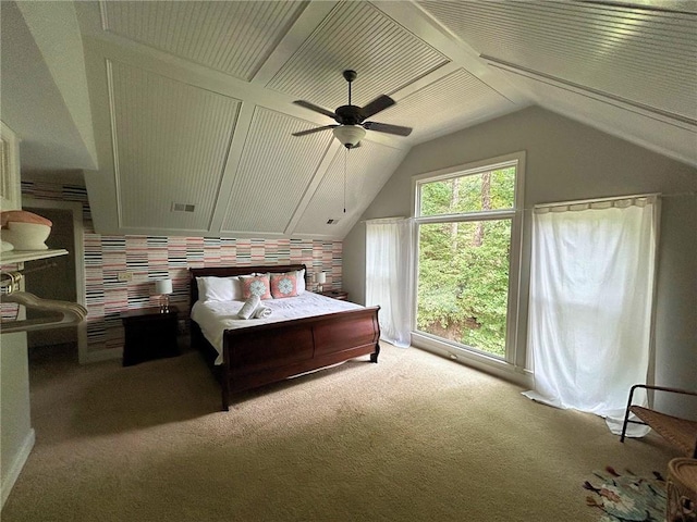 carpeted bedroom featuring a ceiling fan and lofted ceiling