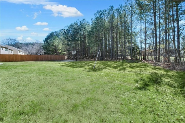 view of yard featuring fence