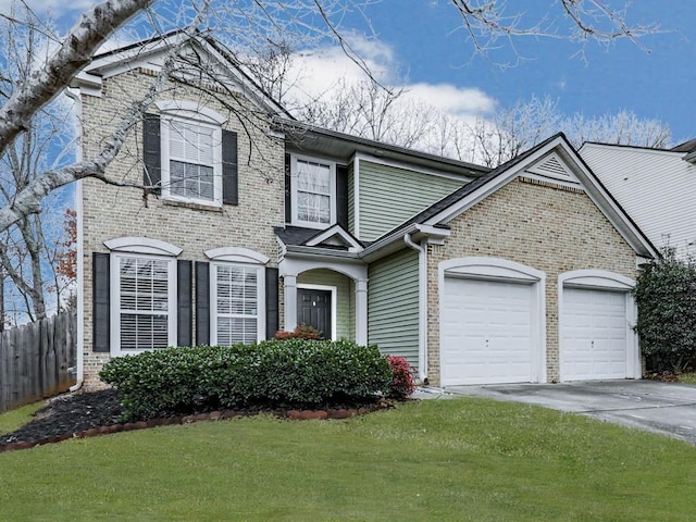 view of front facade featuring a front yard and a garage