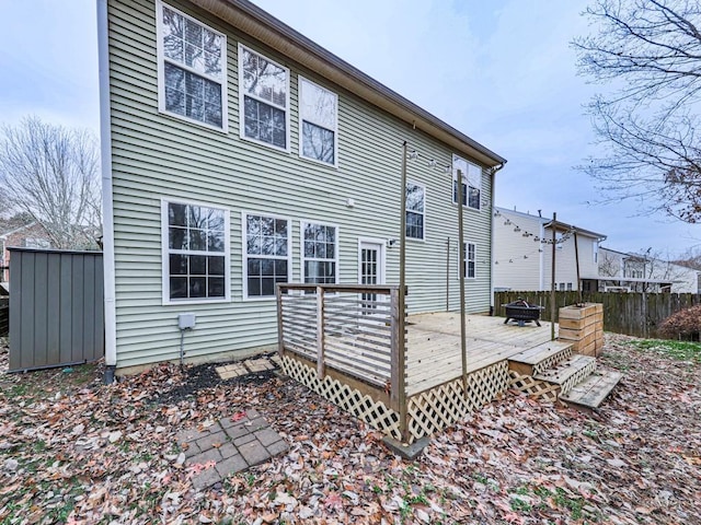 rear view of property with a deck