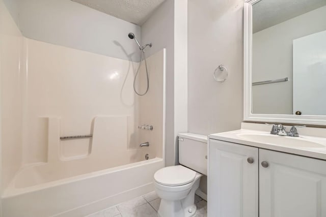 bathroom featuring a textured ceiling, shower / tub combination, vanity, and toilet