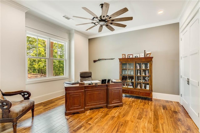 office area with crown molding, ceiling fan, and light hardwood / wood-style flooring