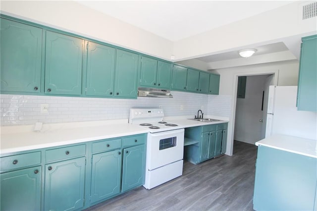 kitchen with decorative backsplash, sink, white appliances, and dark wood-type flooring