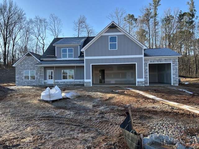 craftsman inspired home with a garage