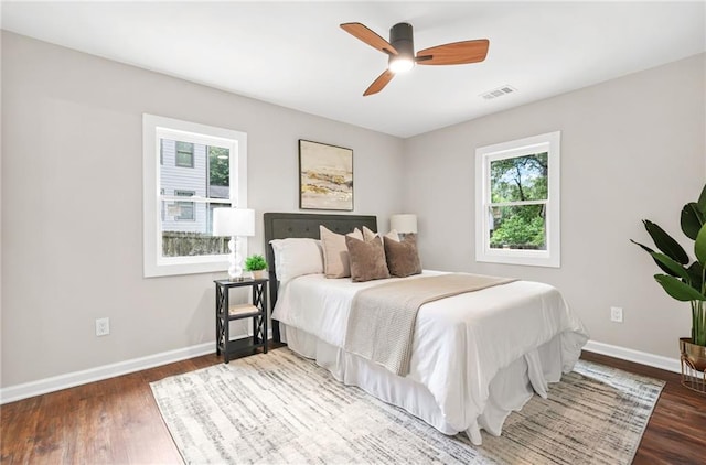 1675 White Oak Way, Decatur, GA 30032 - bedroom featuring multiple windows, wood finished floors, and a ceiling fan