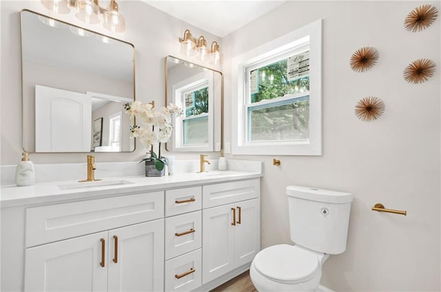 1675 White Oak Way, Decatur, GA 30032 - bathroom featuring double vanity and toilet