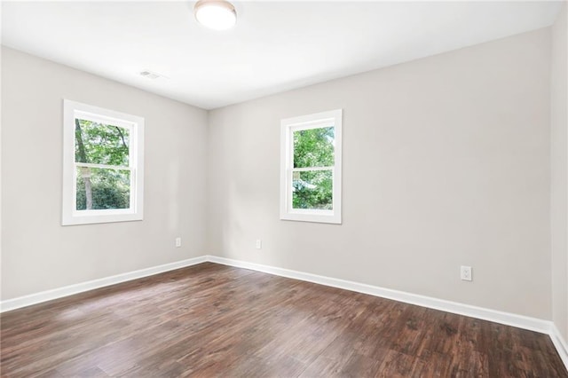 1675 White Oak Way, Decatur, GA 30032 - spare room featuring plenty of natural light and dark wood finished floors