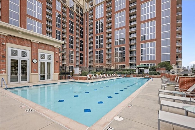 view of pool featuring a patio area