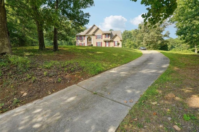 view of front of home with a front lawn