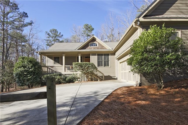 270 Sleepy Hollow Cir, Jasper, GA 30143 - view of front of house featuring driveway, a porch, and a garage