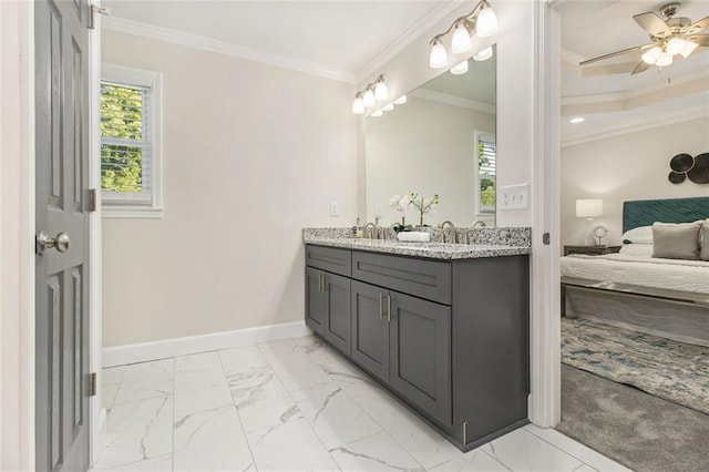 full bath featuring ensuite bath, healthy amount of natural light, marble finish flooring, a ceiling fan, and crown molding