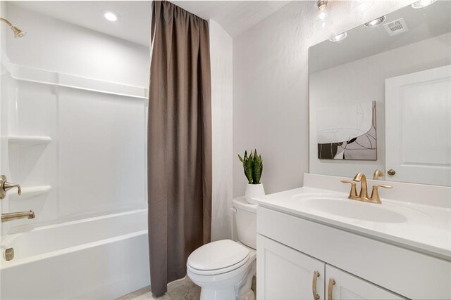 full bathroom with vanity, toilet, and shower / bathtub combination with curtain